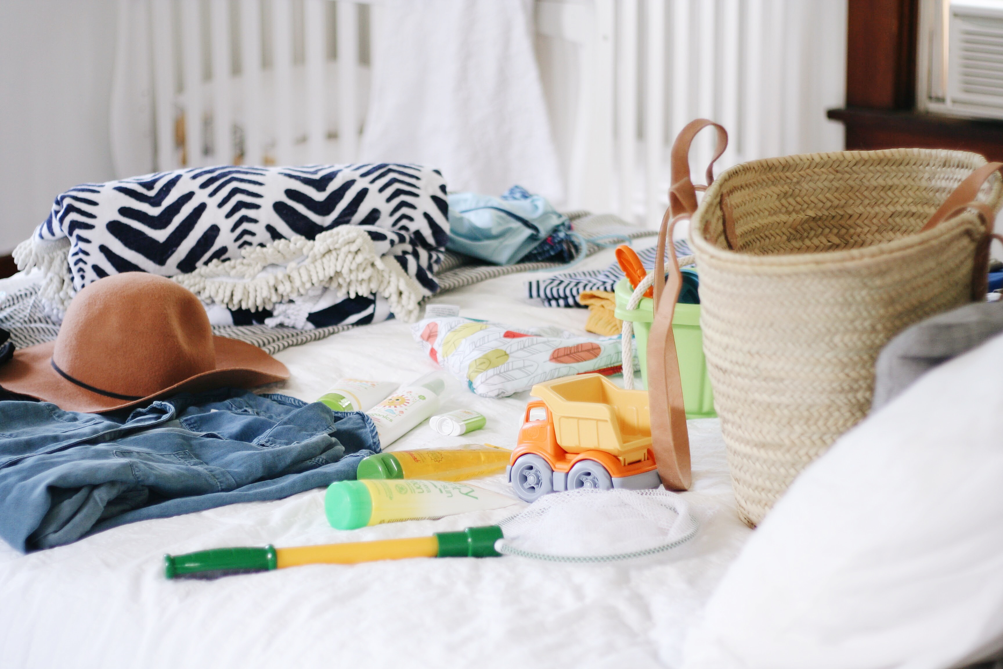 In my bag | a beach tote with babies via thelovelylauralife.com